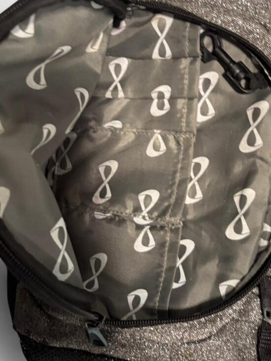Nfinity cheer backpack in a sparkly gunmetal/charcoal finish with black trim and